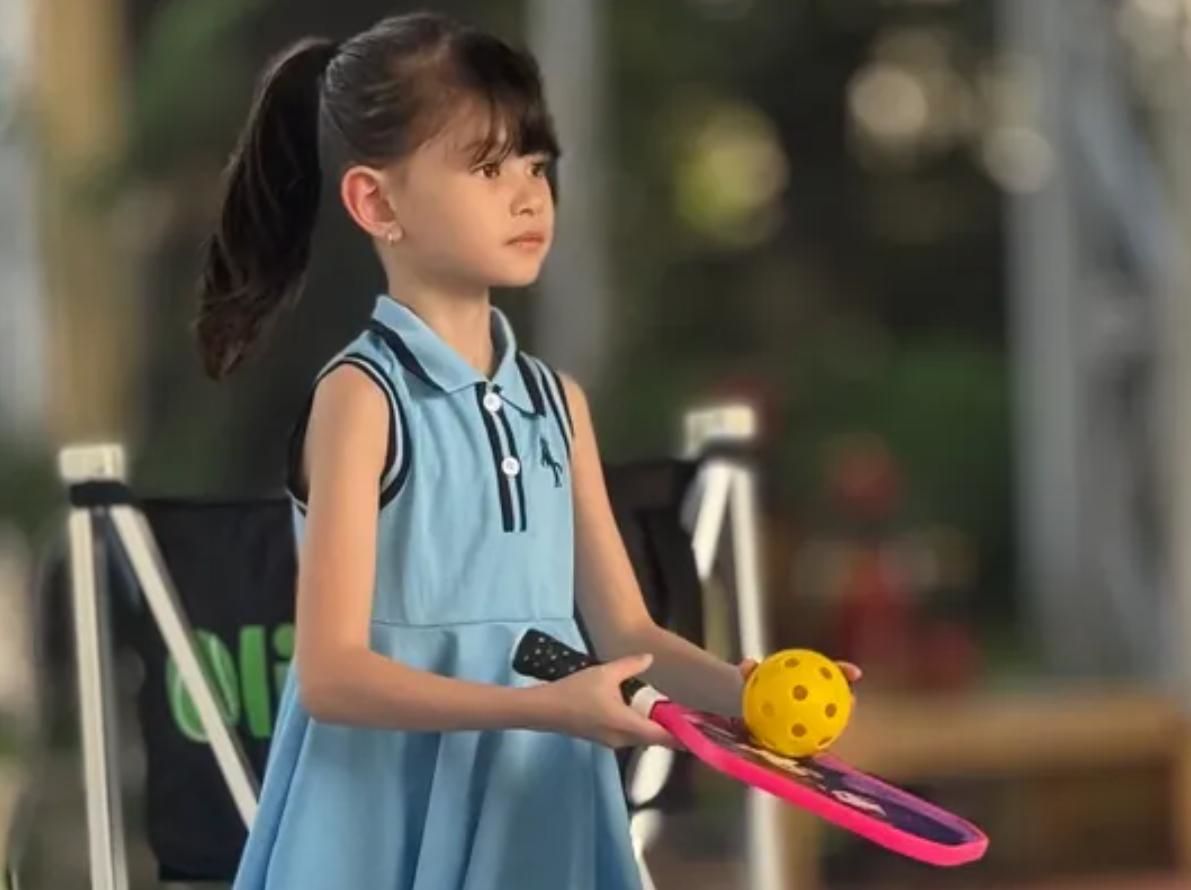 Chloe playing pickleball